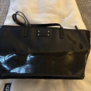 Black, gently used Kate Spade shiny purse